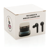 TWS oordoppen in oplaadcassette en draadloze oplader