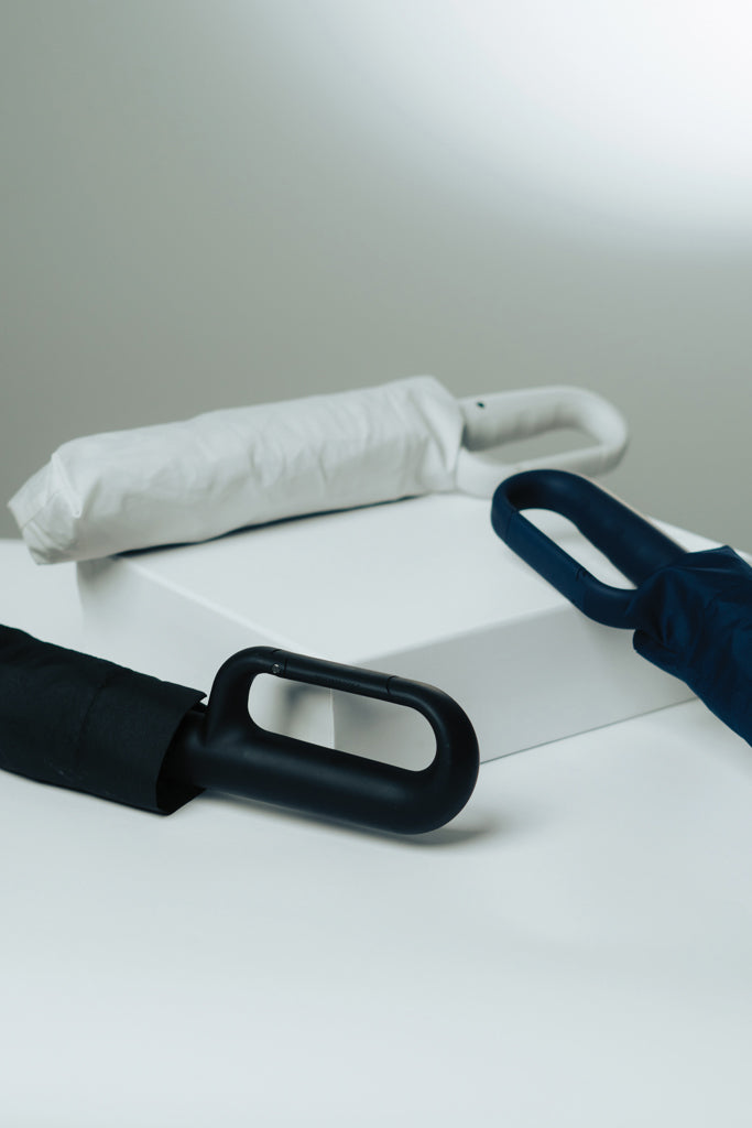 Yara 21" AWARE™ RPET paraplu in unikleur met karabijn hendel